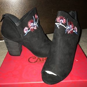 Carlos Santana heels